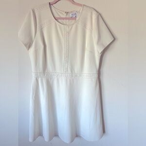 Elle in women’s dress